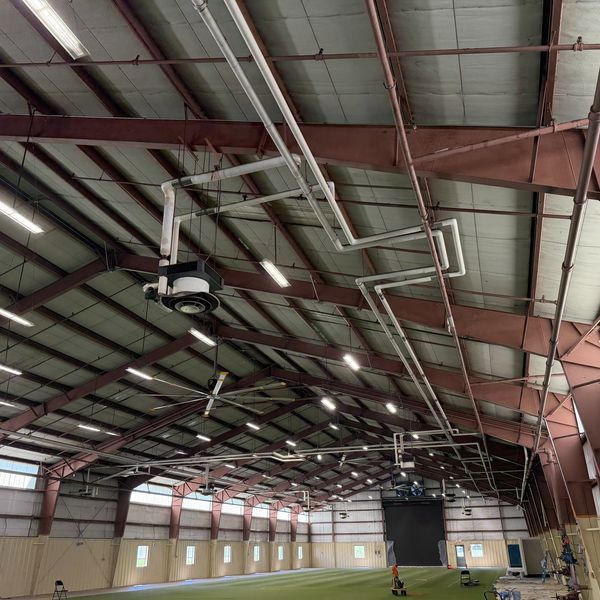 Arena lighting and fans on a steel structure